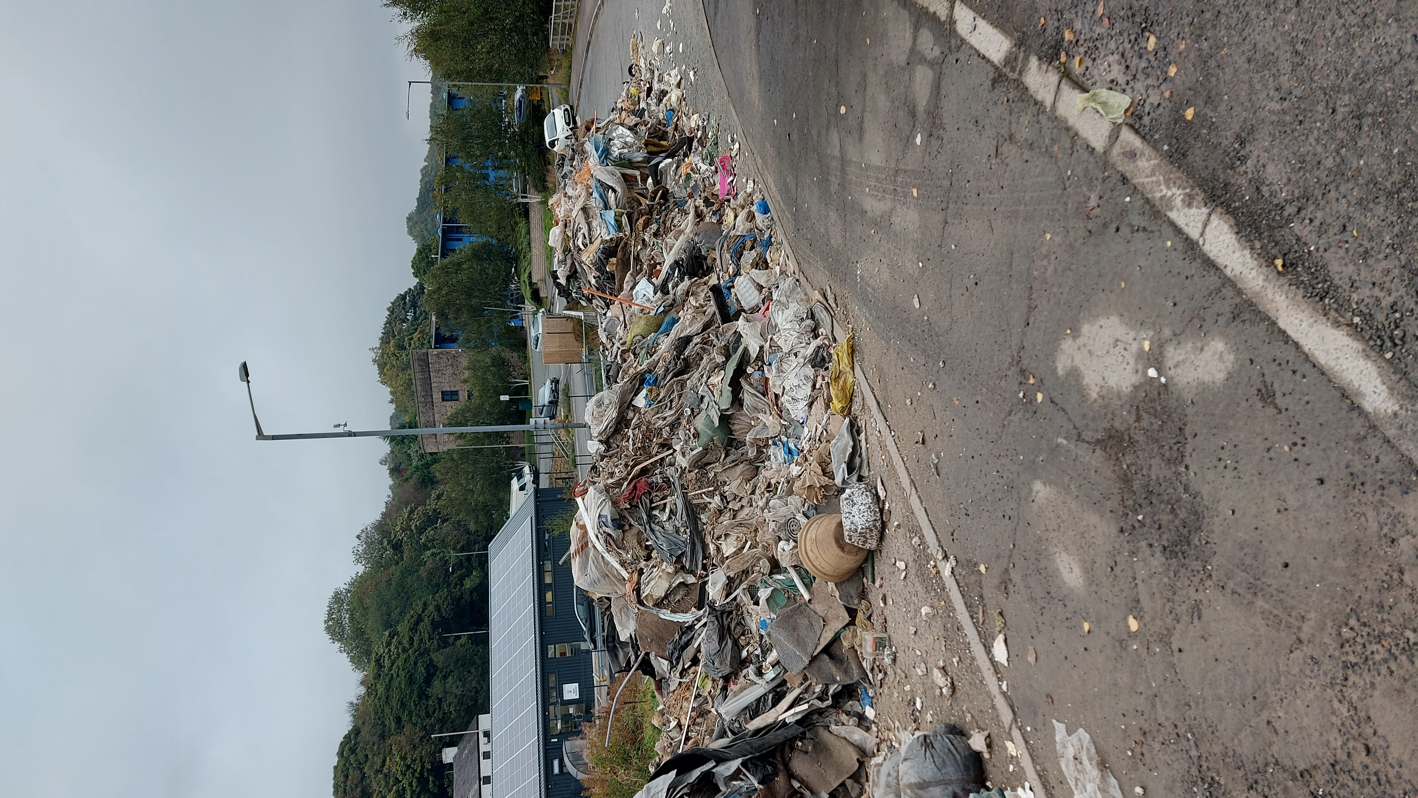 huge amount of fly tipped waste dumped